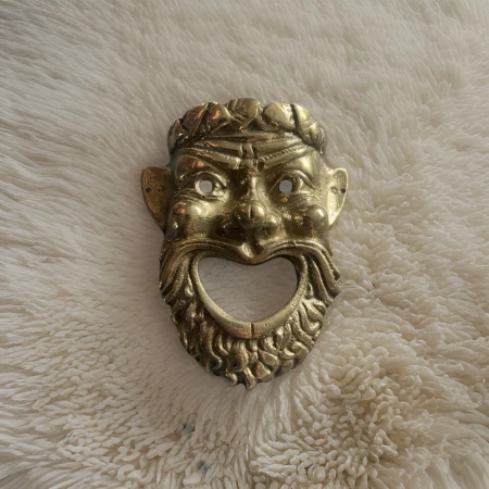 Masque en laiton murale