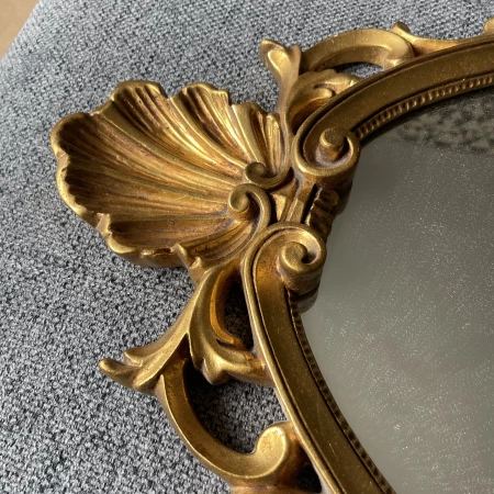 Miroir ovale doré